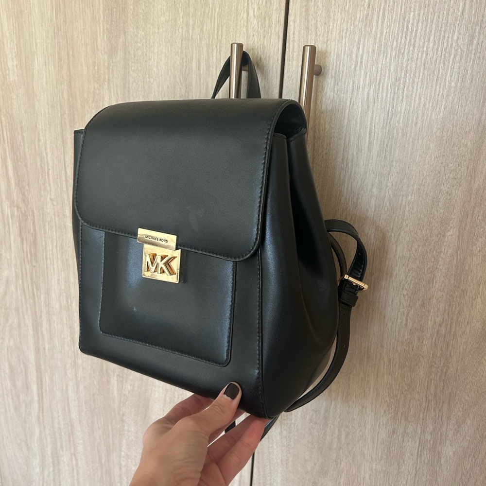 Michael Kors Black leather Backpack with gold buckles & details